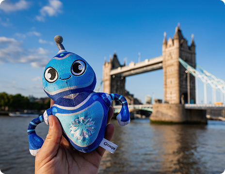 Navi doll in front of a bridge in London